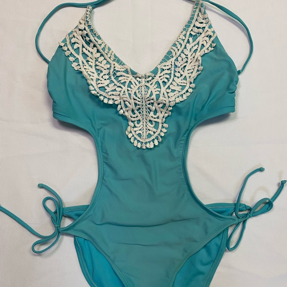 One piece aquamarine bathing suit